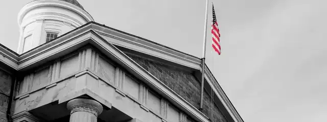 A government building with an American flag