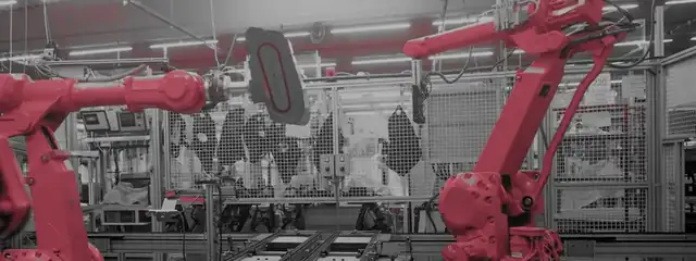 Robotic arms on a production line