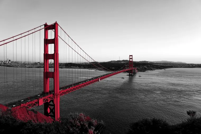 The Golden Gate Bridge at sunset, looking toward San Francisco
