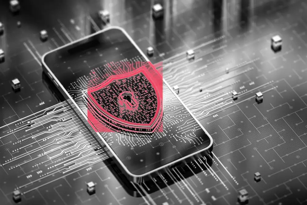 A smartphone on a circuit board with a glowing shield on its screen, representing a mobile app protected by security testing